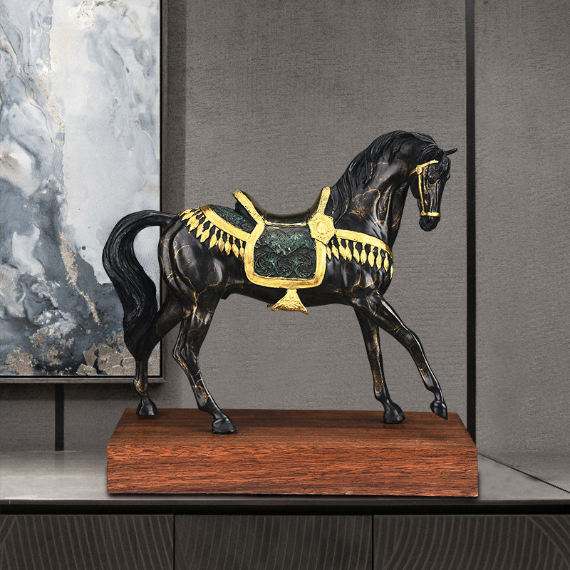 Black horse with gold saddle