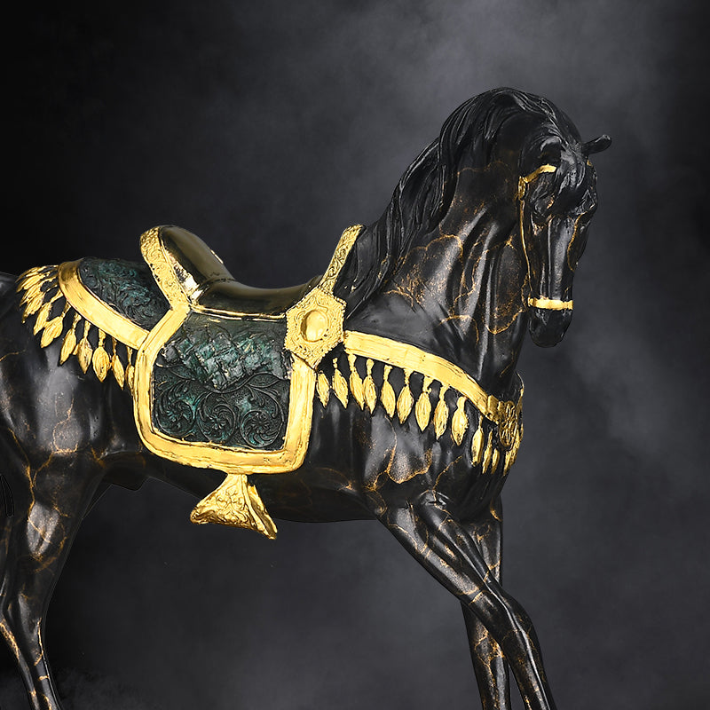 Black horse with gold saddle