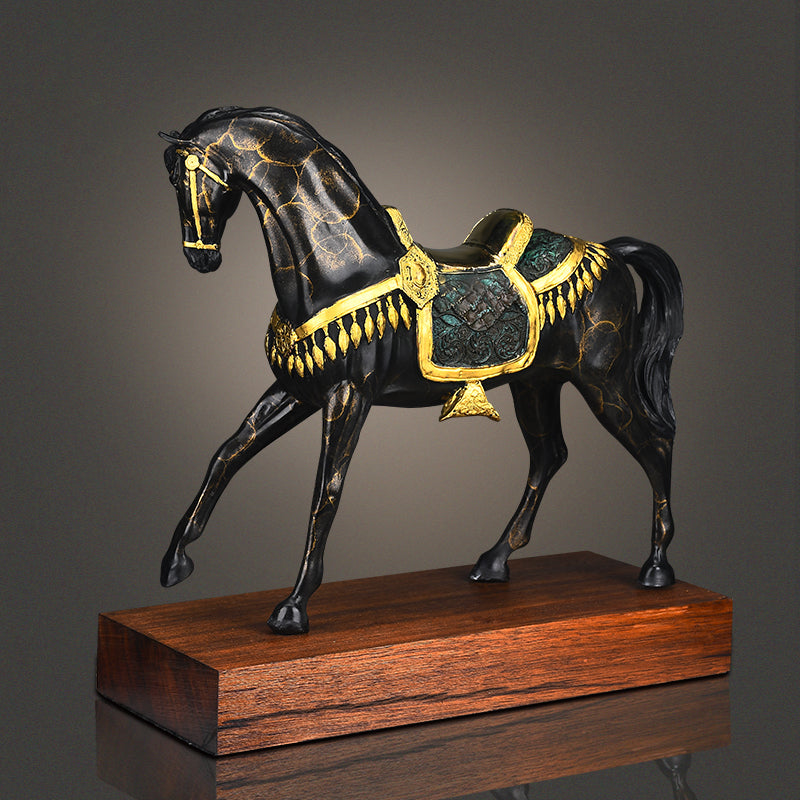 Black horse with gold saddle